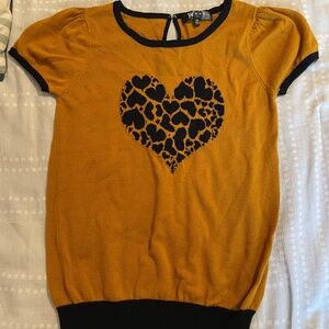 Yellow sweater with heart